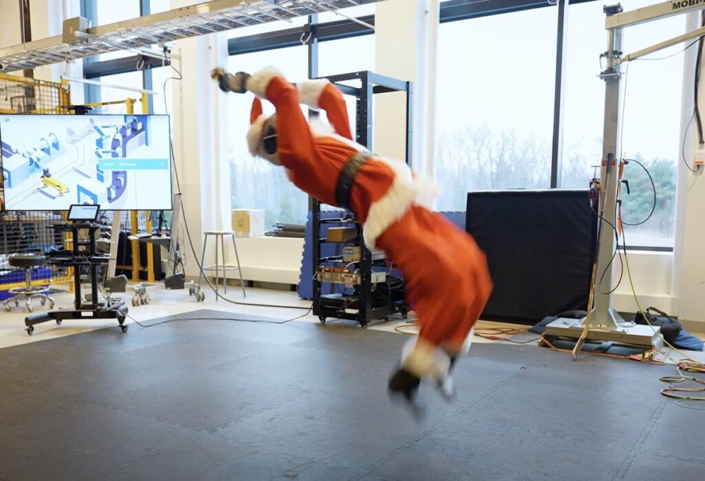 Atlas Robot Backflips In Festive Santa Suit